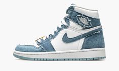 The Women’s Air Jordan 1 High OG “Denim” is a women’s-exclusive version of Michael Jordan’s first signature shoe in a denim-constructed colorway.  A Spring 2022 release, the “Denim” makeup of the vintage basketball shoe features a “do-it-yourself” design with frayed denim overlays against a white leather base.  Specifically, the perforated toe, mid-panel, and collar appear in white leather while the overlays and Swoosh are designed in the aforementioned denim construction with rough edges.  A wh Jordan 1 High Og Denim, Logo Wings, Nike Internationalist, Jordan Model, Blue Jordans, Jordan Retro 1, Womens Air Jordans, Adidas Spezial, Jordan 1 High Og