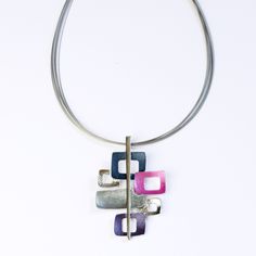 "Looking for the perfect statement piece for your collection? You've found it! This beautiful bohemian interlocking squares necklace in rose gold with beige, teal, and orange will add a unique touch to any outfit. Necklace is made with a steel cable chain and a zinc alloy pendant with a galvanic finish in rose gold.  Interlocking Square Pendant is approximately 7 cm x 4 cm Necklace Chain is adjustable 42 cm - 47 cm (17\"-19\") - - - - - - - - - - - - - - - Please contact me through Etsy for addi Modern Metal Necklace With Square Pendant, Modern Square Pendant Metal Necklace, Square Metal Necklaces For Gifts, Square Metal Necklace For Gift, Modern Metal Necklace With Rectangular Pendant, Silver Square Metal Necklace, Square Silver Metal Necklace, Modern Rose Gold Metal Necklace, Bohemian Square Necklace For Gift