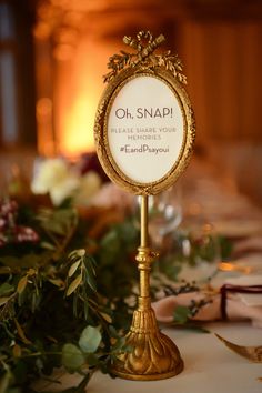 a table with a sign on it that says oh snappi