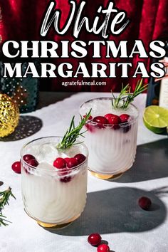 two glasses filled with white christmas margaritas