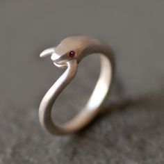 Please read my shop announcement for delivery time. If you need it by a specific date, please contact me first. Thank you! Gift packaging as well as a gift note is available at checkout. Add your message in the note box during checkout. Snake ring with tail in mouth in sterling Unique Sterling Silver Jewelry With Tension Setting, Unique Sterling Silver Snake Ring With Gemstone, Fine Jewelry Silver Rings With Diamond Eyes, Unique Ruby Ring With Polished Sterling Silver, Unique Sterling Silver Snake Ring For Formal Occasions, Snake Tail, Snake Jewelry, Snake Ring, A Snake