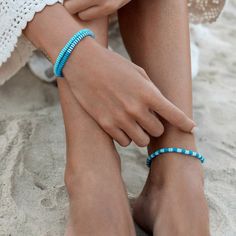 Experience the calm and serene essence of the ocean with our Pura Vida Canal Blues Seascape Stretch Bracelet. Made from high-quality materials, this stretch bracelet offers a comfortable and secure fit. Its vibrant colors and unique design add a touch of beauty to any outfit. Perfect for anyone who loves the ocean and wants to add a pop of color to their style. Vinyl discs are strung on durable stretch elastic cord that adjusts and stretches to any size Silver plated brass logo bead is approximately 3.5mm in diameter Total length of bracelet: 6.5" Because jewelry products are handcrafted by artisans, dimensions may vary from piece to piece Easy On Easy Off- one size fits most Free People Sandals, Pura Vida Bracelets, Wedge Loafers, The Calm, Maternity Shops, Neon Blue, Metal Charm, Stretch Bracelet, Girls Accessories