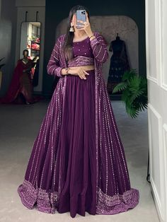 This stunning purple georgette designer crop top lehenga with jacket. The fully stitched lehenga features a crushed design in a beautiful purple color, paired with a matching choli and jacket adorned with intricate thread embroidery and sequin work. Perfect for weddings, receptions, parties, and other special occasions, this ensemble is sure to make you stand out. Available in sizes XS to L, this lehenga choli set is a must-have for every fashion-forward woman. The maroon crop top adds a trendy touch, while the jacket adds a touch of elegance to the overall look. Pair it with a stylish bun and heels for a complete and memorable outfit that will make you the center of attention. Plain Lehenga, Indo Western Lehenga, Zip Stitching, Western Lehenga, Lehenga Crop Top, Crop Top Lehenga, Stitched Lehenga