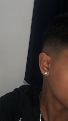 a young man with ear piercings on his ears