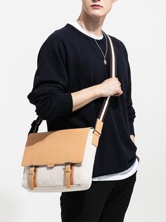 Editor's NotesThe simple cross bag that is made of cow leather and canvas material is featuring polygon detail.- Cow leather, canvas material- Enough space to store- Adjustable strap and buckle- Cross bag- Double belt closureMeasurements(in.)- Size: 12.59 in. (W) / 9.84 in. (H) / 2.75 in. (D)Composition & Care- Cow leather, Canvas- Professional cleaning is recommendedDesigner- by BEDFORD 11TH Beige Coated Canvas Crossbody Shoulder Bag, Beige Coated Canvas Shoulder Bag, Beige Coated Canvas Satchel Shoulder Bag, Cream Shoulder Bag With Leather Trim, White Leather Handles Shoulder Bag For Business, Beige Coated Canvas Shoulder Bag With Adjustable Strap, Beige Leather Trim Satchel Shoulder Bag, Beige Canvas Satchel With Adjustable Strap, Versatile Leather Shoulder Canvas Bag