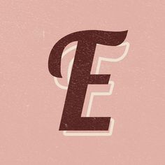 the letter e is made up of letters that appear to be painted pink and brown