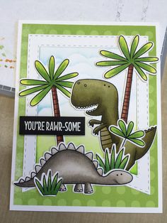 a close up of a card with a dinosaur and palm trees in the background that says, you're baar - some