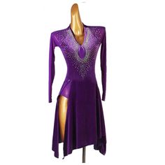 a purple figure skating dress on a mannequin