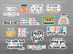 some stickers that are on top of a metal surface, with words and phrases