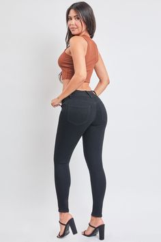 If all the world is a stage, then our Women’s Essential 3 Button High Rise Skinny Jeans will really steal the show. This high-waisted denim jean features a stretchy composition for the perfect hip-hugging look, and tapers down to a narrow ankle for a slimming silhouette that still shows off your natural shape. Pair with a tucked tank or a fitted crop to really flaunt your gorgeous frame. Product Details- High Rise - 3 Button Closure with Zipper - 5 Pocket Construction - Slim in Waist, Hip, and L Casual High Waist High Stretch Jeans, Tight High Waist Elastane Jeans, Tight High Waist Jeans, Trendy Stretch High Waist Cropped Jeans, Trendy High Rise High Stretch Jeans, High Stretch High Waist Dark Wash Jeans, High Rise High Stretch Pants, High-rise High-stretch Denim Pants, Dark Wash High Stretch Mid-rise Jeans