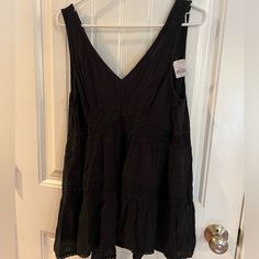 American Eagle Sleeveless Top. Color Is Black With Some Lace. Top Is V-Neck And Very Loose, Maybe A Little Longer Than A Traditional Shirt. Size Medium. Cotton V-neck Tank Top For Night Out, Black Cotton V-neck Tank Top, Black V-neck Tank Top For Day Out, Black V-neck Tank Top For Spring, Black Lace Top, Eagle Black, Black Lace Tops, Black Lace, American Eagle Outfitters