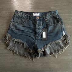 One Teaspoon Shorts Brand New With Tags Le Wolves Very Long Fringe Distressed Style Dark Blue Grey Color Size 25 Measurements Included ______________________________________ Check Out The Rest Of My Closet! I Have A Ton Of Similar Items!! Don’t Have A Poshmark Account Yet? Sign Up And Get $10 Off Your Order Using Code: Relloved Tags Boho Y2k Beachy Trendy Trending Dainty Summer Knit Woven Cozy Comfy Slouchy Oversized Chunky Shapewear Leather Chic Minimalist Streetwear Unisex Stylish Vintage Retr Washed Blue Cutoff Jean Shorts With Frayed Hem, Trendy Washed Blue Shorts With Frayed Hem, Trendy Washed Blue Cutoff Jean Shorts, Washed Blue Ripped Cutoff Jean Shorts, Dark Wash Washed Denim Jean Shorts, Distressed Dark Wash Denim Jean Shorts, Distressed Dark Wash Jean Shorts, Blue Washed Cutoff Jean Shorts, Distressed Dark Wash Cotton Shorts