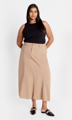 Indulge in the playful yet chic style of our Laylo Skirt. Perfect for your off-duty events, this skirt flaunts a high-rise, stretch fabrication and cotton blend for utmost comfort. Key Features Include: - High-rise fit - Button and zip closure - Seam detailing - Belt loops - Cotton blend - Stretch fabrication - Midi length Pair with a gold chain cross-body bag for a glam finish. | Plus Size Skirt Laylo in Caramel, Size 20/L | City Chic | Plus Size Skirt Laylo in Caramel, Size 20/L, Cotton | City Midi Sweater Skirt, Midi Skirt Casual, Plus Size Workwear, Midi Flare Skirt, Knit Maxi Skirt, Ladies Of London, Plus Size Skirts, Chic Woman, City Chic