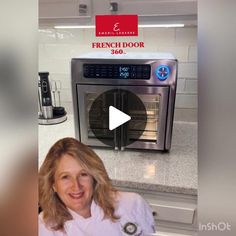 a woman standing in front of an oven with the words french door 300 on it