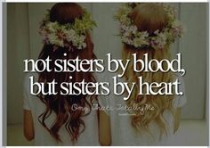 two girls with flowers in their hair and the words not sisters by blood, but sisters by heart