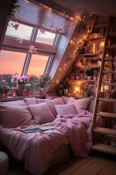 an attic bedroom with pink bedding and flowers in the window sill at sunset