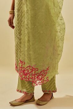 Green kurta featuring floral silk applique motifs and bead sequin embroidered chevron patterns. Comes with embellished pant, scalloped hem dupatta and inner slip. - Aza Fashions Pista Green Embellished Organza Sets, Green Tissue Silk Sets With Floral Embroidery, Green Floral Embroidered Tissue Silk Sets, Green Floral Embroidery Tissue Silk Sets, Summer Festive Palazzo Set With Intricate Embroidery, Fitted Silk Embellished Palazzo Set, Embellished Fitted Silk Palazzo Set, Summer Festive Organza Palazzo Set, Summer Festive Sets With Intricate Embroidery