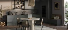 a dining room table and chairs in front of an open kitchen with lots of shelves