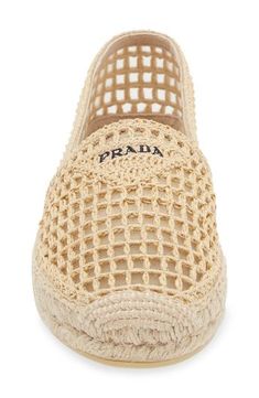 A mesh upper overlaid with woven raffia brings breezy charm to this laid-back espadrille branded with a subtle version of Prada's iconic triangular logo. 3/4" (19mm) platform (size 9US / 39EU) Textile upper and lining/synthetic sole Made in Spain Designer Shoes Natural Woven Straw Espadrilles, Elegant Espadrilles With Woven Sole For Beach, Elegant Beach Espadrilles With Woven Sole, Beige Woven Leather Espadrilles For Spring, Spring Beige Woven Leather Espadrilles, Elegant Beige Straw Espadrilles, Casual Beige Espadrilles With Woven Leather, Casual Beige Woven Leather Espadrilles, Chic Natural Espadrilles With Woven Sole