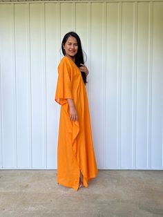 Unwind in absolute comfort with our semi sheer cotton gauze kaftan. This kaftan is perfect for the beach, pool, resort and laid-back time at home. Crafted from quality soft and breathable gauze cotton, it offers an airy fit that's ideal for lounging and cover up. Its relaxed design and easy slip-on style make it your go-to choice for outdoor cover up and relaxed nights at home. Summer Maxi Kaftan For Daywear, Unlined Summer Maxi Dress For Loungewear, Casual Orange Kurta For Summer, Beach Linen Kaftan, Linen Kaftan For Beach, Flowy Beachwear Kaftan For Daywear, Summer Cotton Maxi Tunic, Linen Kaftan For Vacation, Long Summer Maxi Dress For Loungewear