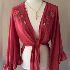 Embroidered Floral Detail Cardigan With Wide Sleeves Front Tie Gorgeous Embroidered Cardigan Features Bell Sleeves. Can Be Worn Tied Or Open Polyester. Size Small 4/6 Medium 8/10 Boho Bohemian Dreamy 70s Retro Western Babe Festival Travel Fashion Vacation Babe Concert Party Brunch Bohemian Open Front Tops For Brunch, Red Open Front Cardigan For Spring, Red Open Front Tops For Spring, Red Open Front Top For Spring, Spring Red Open Front Top, Embroidered Red Cardigan For Fall, Red Long Sleeve Cardigan For Festivals, Red Embroidered Fall Cardigan, Red Bohemian Spring Cardigan