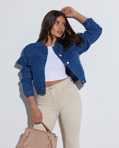 The Perez Denim Ruffle Jacket features feminine ruffles on the sleeves and at the bust. It has sleek, barely-there side pockets and looks great layered over crop tops. Regular fit Collared Ruffle detailing Side pockets Front button closures 97% Cotton 3% Spandex Chic Cropped Denim Jacket In Medium Wash, Chic Cropped Medium Wash Denim Jacket, Chic Cropped Denim Jacket With Pockets, Cropped Denim Jacket With Pockets, Ruffled Denim Blue Denim Jacket, Trendy Denim Blue Top With Ruffles, Casual Fitted Denim Jacket With Ruffles, Fitted Denim Outerwear With Ruffles, Trendy Ruffled Denim Jacket For Fall