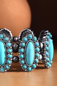 This Navajo Western Natural Stone Stretch Bracelet is a fashionable accessory for everyone's jewelry box! It features beautiful stones in a modern style bracelet design to add some serious bling to your evening wardrobe. Come on, rock this bracelet! *APPROX. L 8.25" Diameter 2.5" Turquoise Bracelet Jewelry, Turquoise Bracelet Fashion Accessory, Trendy Turquoise Bangle Jewelry, Turquoise Fashion Bracelet, Elegant Turquoise Bracelets, Southwestern Adjustable Jewelry With Stones, Bohemian Metal Bracelets With Stones, Beaded Turquoise Metal Jewelry, Adjustable Metal Bracelets With Stones