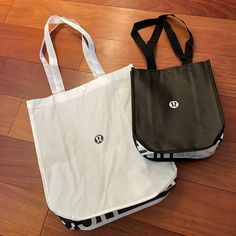 Includes 2 Luluemon Athletica Shopping Totes- As Pictured New, Never Used. Perfect Condition White Reversible Bag For Everyday Use, Reversible White Bag For Everyday, White Reversible Bag, Lululemon Shopping, Shopping Totes, Shopping Bags, Womens Tote Bags, Lululemon Athletica, Reusable Tote Bags