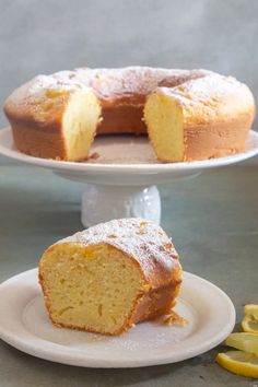 a bundt cake on a plate with one slice cut out