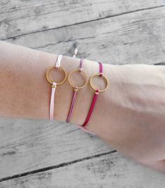 Minimalist Adjustable Bracelets For Birthday, Minimalist Adjustable Bracelet For Birthday, Minimalist Pink Round Bracelet, Minimalist Adjustable Bracelets For Birthday Gift, Minimalist Adjustable Bracelet For Birthday Gift, Adjustable Dainty Circle Bracelets, Dainty Adjustable Circle Bracelets, Adjustable Circle Bracelets As Gifts, Gift Bracelets With Sliding Knot