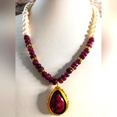 Genuine Ruby 17.08 Carat Pendant & Ruby And Pearls Necklace This Necklace Has A Large 18x25mm Teardrop Ruby. The Stone Is Untreated And Un-Enhanced. It Is Checkered Cut. Certified. It Is Set On A Brushed Gold Bezel. There Are 26 Genuine Ruby Beads. Unheated And Untreated. They Are Not Uniformed. It Comes With Freshwater Pearls. Does Not Come With Earrings. Please Look Through My Listings For Matching Earrings. Matching Bracelet Can Be Found In Another Listing. A Photo Of The Bracelet Was Uploade White Ruby Necklace Perfect For Gifts, White Ruby Necklace For Gift, White Teardrop Faceted Necklace, White Faceted Teardrop Necklace, Earrings Matching, Royal Dresses, Ruby Beads, Pearls Necklace, Ruby Jewelry