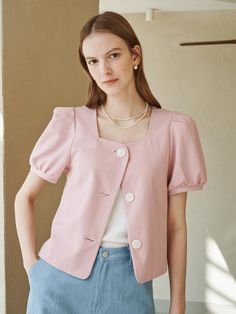 Softly structured, this effortless blouse.It is exceptionally soft and durable.Great outfits start here. - Square neck and puff sleeve blouse- Cropped blouse, it's cute and fit perfectly everywhere- Two way styles, jacker or blouse - Button closure and different hem length- It looks as good in the office as it does out Feminine Padded Blouse, Short Sleeve Puff Sleeve Top For Workwear, Daywear Tops With Puff Gathered Sleeves, Feminine Puff Sleeve Blouse For Daywear, Feminine Padded Blouse For Day Out, Feminine Puff Sleeve Workwear Blouse, Feminine Padded Blouse For Workwear, Feminine Puff Sleeve Blouse For Workwear, Feminine Tops With Blouson Sleeves