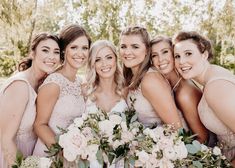 a group of women standing next to each other