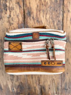 Photo of front of pastel aztec print woven cosmetic bag with leather accents Bohemian Rectangular Travel Cosmetic Bag, Muted Pink, Make Up Brushes, Train Case, Maroon Color, Aztec Print, Makeup Organization, Print Fabric, Leather Trim