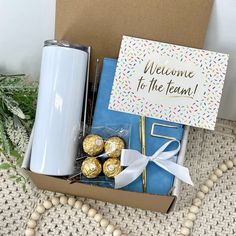 a welcome gift box filled with chocolates and candy