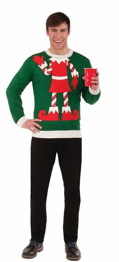 a man in an ugly christmas sweater holding a cup