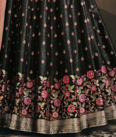 COLOR : Black & Pink FABRIC : Jacquard Banarasi Silk WORK : Woven Zari & Thread Work, Resham Embroidery & Metal Embellishments (around neckline), Tassels (on dupatta), Lace Border OCCASION : Wedding, Reception, Festival, Party Wear, Sangeet READY-TO-WEAR : NoSTITCHING : Available as semi-stitched fabric, can be stitched using standard size option (+$20). Note: There might be a slight color variation due to lighting and flash used during photoshoot. The bright shade seen is the best closer view o Party Wear Anarkali, Dupatta Lace, Resham Embroidery, Metal Embellishments, Holiday Promotions, Anarkali Gown, Lace Border, Thread Work, Pink Fabric