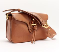 Take what you need, leave behind what you don't, with this mid-size everyday crossbody. Gorgeously accented with knots and brushed hardware, it imparts classic-chic vibes to denim and dress looks alike. From Vince Camuto. Carry Conceal Purses, Purse Trends, Brown Crossbody Bag, Cowhide Bag, Fall Handbags, Classic Chic, Best Bags, Look Alike, Vince Camuto