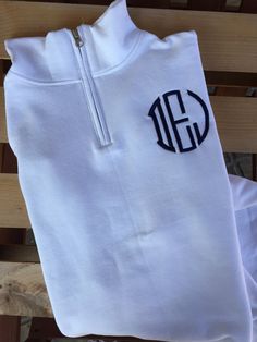 These monogrammed quarter zip sweatshirts are perfect gifts. Super soft and cozy! Great for birthday gifts, bridesmaids, Mother's Day too! These sweatshirts are made out of 8-ounce, 50/50 cotton/poly NuBlend®; pill-resistant fleece High-stitch density for a smooth-printing canvas Stylish zip-through cadet collar Covered aluminum zipper for maximum print area Rib knit cuffs and waistband Double-needle coverstitching on armholes and waistband I use a commercial embroidery machine with high quality White Monogram Cotton Sweatshirt, White Monogram Crew Neck Top, White Casual Monogram Top, Sporty White Tops With Custom Embroidery, Ladies Sweatshirt, Commercial Embroidery Machine, Monogram Sweatshirt, Applique Monogram, Half Zip Sweatshirt