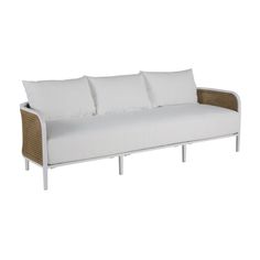 a white couch with four pillows on it's back and sides, against a white background