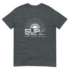 SUP SURF T-Shirt | Surf Tshirt | SUP shirt | SUP tshirt | Surf | Paddle board | Mens Shirt | Guy Shirt | Boyfriend Shirt | Mens T shirt  We've taken our SUP SURF Sun graphic to the front! For those who love the graphic tees with designs on the front here you go!  Our design draws inspiration for the sport of SUP Surfing aka Stand Up Paddle board surfing.   Please use size guide in images for sizing. Simply order using drop down menus to choose size and tshirt color You've now found the staple t-shirt of your wardrobe. It's made of 100% ring-spun cotton and is soft and comfy. The double stitching on the neckline and sleeves add more durability to what is sure to be a favorite!   * 100% ring-spun cotton * Sport Grey is 90% ring-spun cotton, 10% polyester * Dark Heather is 65% polyester, 35% White Surfing T-shirt With Text Print, Surfing Short Sleeve T-shirt With Text Print, Short Sleeve T-shirt With Text Print For Surfing, Paddle Board Surfing, Surf T Shirts, Sup Surf, Surf Tshirt, Surf Outfit, Boyfriend Shirt