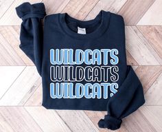 This custom team spirit sweatshirt is perfect for teachers, sports moms, students, or anyone supporting their favorite team. This cozy sweatshirt makes a great game day sweatshirt. Get one for yourself or as a gift for someone! PRODUCT DETAILS     - Gildan 18000 is heavy blend fleece crew sweatshirt     - 50% cotton, and 50% polyester     - Ribbed knit makes the collar highly elastic and helps retain its shape     - Unisex fit - please refer to the size chart in the listing photos for most accur Pre-shrunk Crew Neck Sweatshirt For School Spirit, Team-colored Long Sleeve School Spirit Sweatshirt, Team-colored Long Sleeve Sweatshirt For School Spirit, School Spirit Sports Hoodie With Crew Neck, Team-colored Varsity Tops For School, Team-colored Varsity School Tops, College Team-colored Crew Sweatshirt, Varsity Team-colored Sweatshirt For College, Varsity Style Team-colored School Top