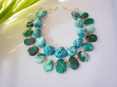 These striking, dramatic necklaces are made with agate and turquoise magnesite stone ( faux turquoise ). Gorgeous and unique! Great idea for gift! 🎁 Necklaces The first necklace use beautiful heavy turquoise magnesite stone. - Length : approximately 18" long, strung with no stretch nylon thread. Finished with 16k gold plated lobster closure and findings. - Beads : Smooth polished turquoise magnesite stone. The second necklace is made with a cool mixture of agate and coral. Separated by 18k gold Oversized Necklace, Dramatic Necklace, Stone Bead Jewelry, Bamboo Coral, Beading Wire, Green Agate, Bead Jewelry, Statement Jewelry, Stone Beads