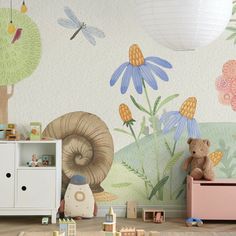 a child's room decorated in pastel colors with flowers and insects on the wall