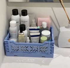 a blue container filled with personal care products