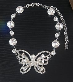 Wear this with a low neckline top.     Perfect for cocktail parties    With round crystal gems     Adjustable length Elegant Crystal Embellished Rhinestone Necklace, Elegant Embellished Crystal Rhinestone Necklace, Jeweled Crystal Necklaces For Parties, Party Crystal Rhinestone Necklace, Glamorous Crystal Necklaces For Party, Evening Crystal Necklaces, Crystal Necklace For Evening, Glamorous Crystal Necklace For Party, Crystal Rhinestone Necklaces