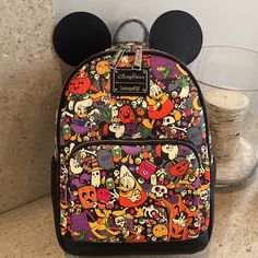 Disney Loungefly Halloween Backpack. Super Cute With Tons Of Space. Two Exterior Pockets On The Side. Front Zippered Pocket And Top Zippered Pocket To Main Area. Brand New With Tags And Never Used. Black Backpack For Theme Parks, Black Disney Bag For Theme Park, Black Disney Style Bag For Theme Park, Black Disney-style Bag For Theme Park, Themed Black Backpack For Everyday Use, Black Backpack For Theme Park, Black Disney Backpack For Travel, Black Backpack For Disney Trips And Back To School, Themed Black Backpack For Theme Parks