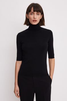 Merino Elbow Sleeve Top | Filippa-k.com Modern Fitted Merino Wool Sweater, Modern Fitted Sweater Solid Color, Modern Fitted Cashmere Sweater, Modern Fitted Wool Tops, Modern Fitted Wool Top, Fitted Modern Top With 3/4 Sleeves, Fine Knit Fitted Sweater With Short Sleeves, Classic Stretch Wool Tops, Classic Stretch Fine Knit Turtleneck