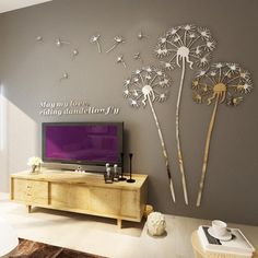 the living room is decorated with metal dandelions