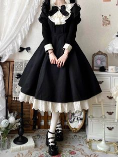 This price includes a dress, an apron and a bowknot jabot. SizeSMLXLBust84889296Full Length105106107108Waist65697377Sleeve Length5858.55959.5Hem Circumference275280285290 Victorian Goth Aprons, Romantic Goth Aprons, Black And White Steampunk Dress, Cute Dress Reference, Retro Dress With Ruffles And Doll Collar, Cute Bow Costume Dress, Vintage Costume Dress With Bow, Vintage Bow Dress For Costume Party, Retro Dress With Ruffles And Peter Pan Collar